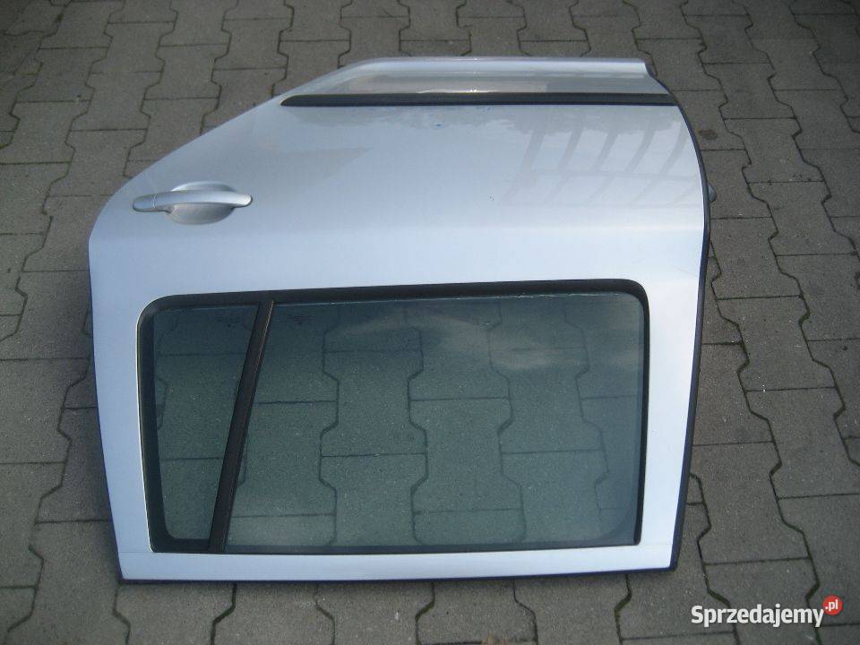 skoda octavia ii 2 0408r drzwi tył lewe kombi Rakoniewice