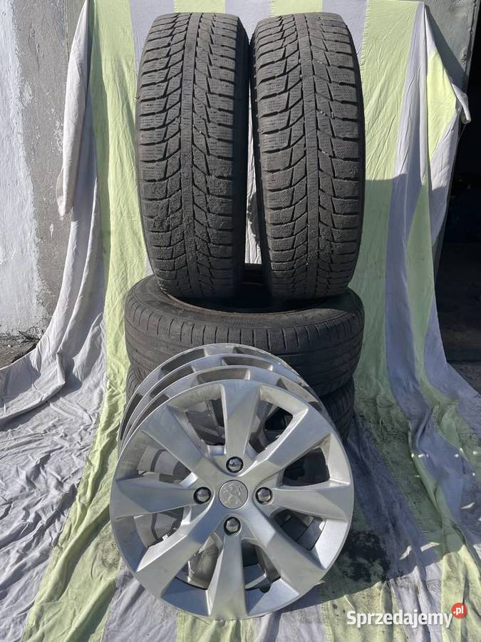 Koła opony kołpaki Peugeot 15