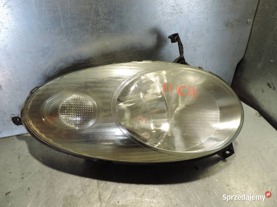 LAMPA PRAWY PRZÓD NISSAN MICRA K12 osobowe Lampy przednie