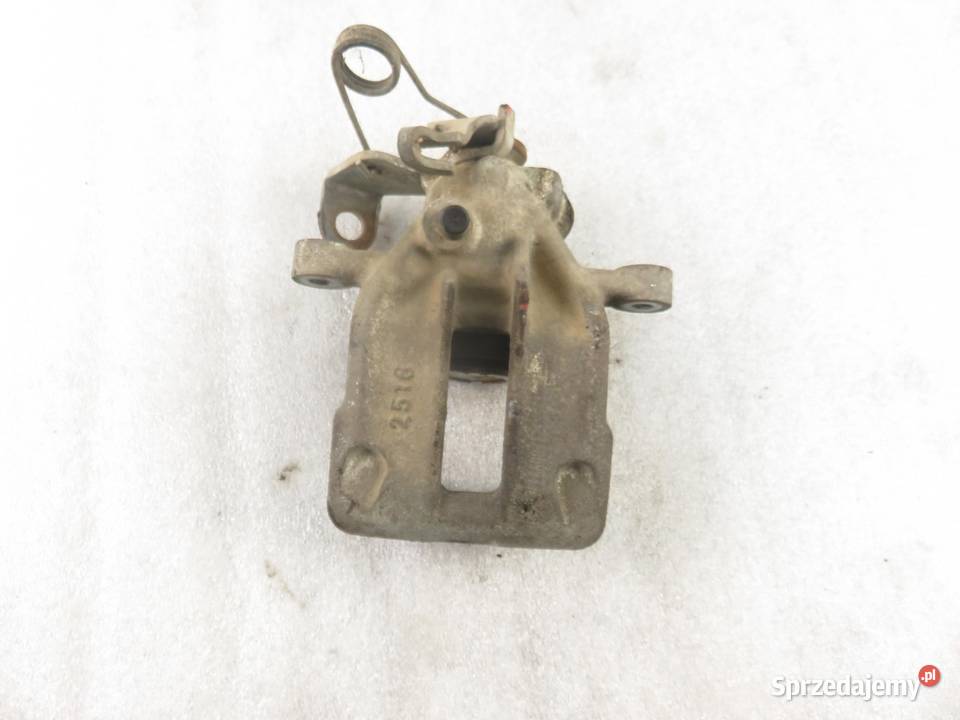 ZACISK LEWY TYŁ AUDI A6 C4 25 TDI osobowe