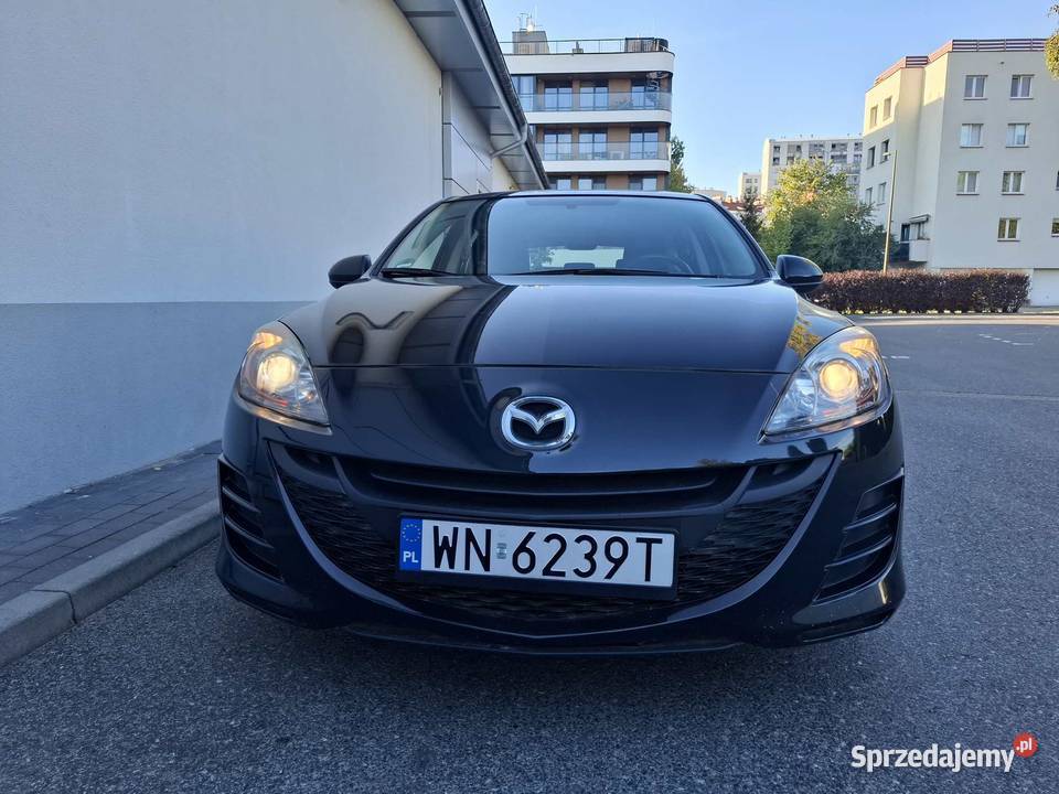 Mazda 3 16 benzyna niski przebieg Szwajcaria centralny zamek mazowieckie Warszawa