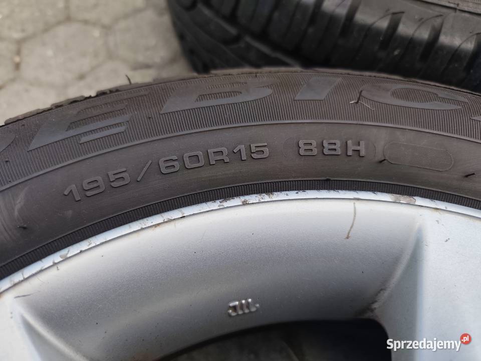 Oryginalne felgi toyota E12 koła toyota Samochodowe Rzeszów sprzedam