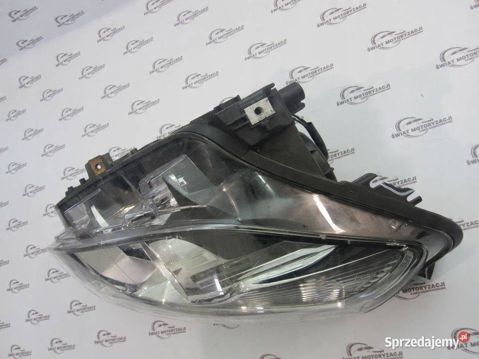 NISSAN QASHQAI I J10 LIFT 10r lampa prawa przód