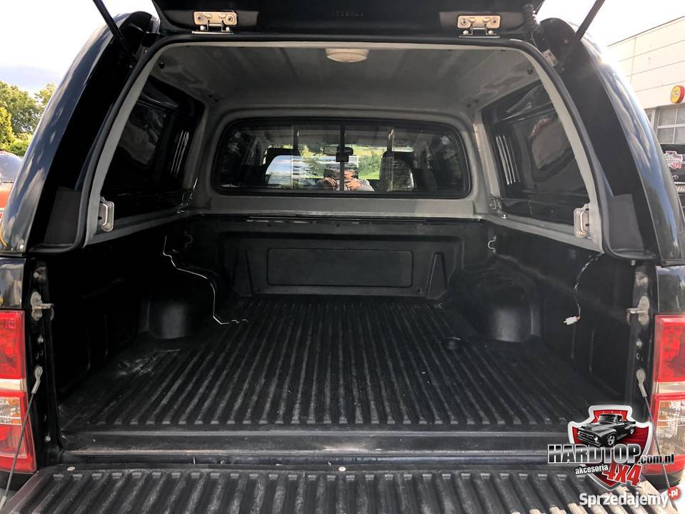 Zabudowa Toyota Hilux 0515 otwierane klapy z Karoseria warmińsko-mazurskie Pasłęk sprzedam