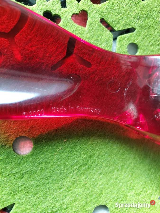Otwieracz czerwony tworzywo niemiecki 2009r dolnośląskie Wrocław