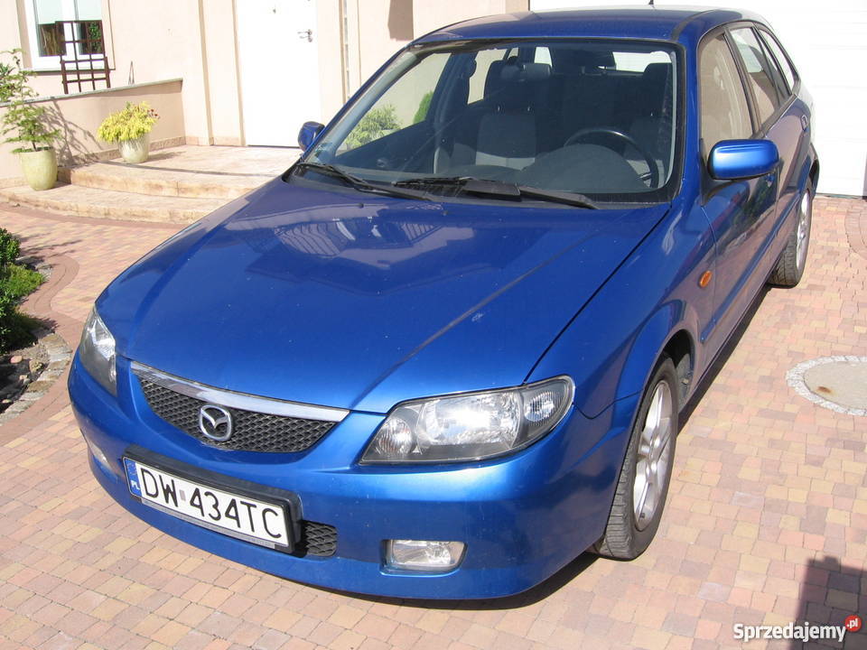 Mazda 323F niebieski metalic