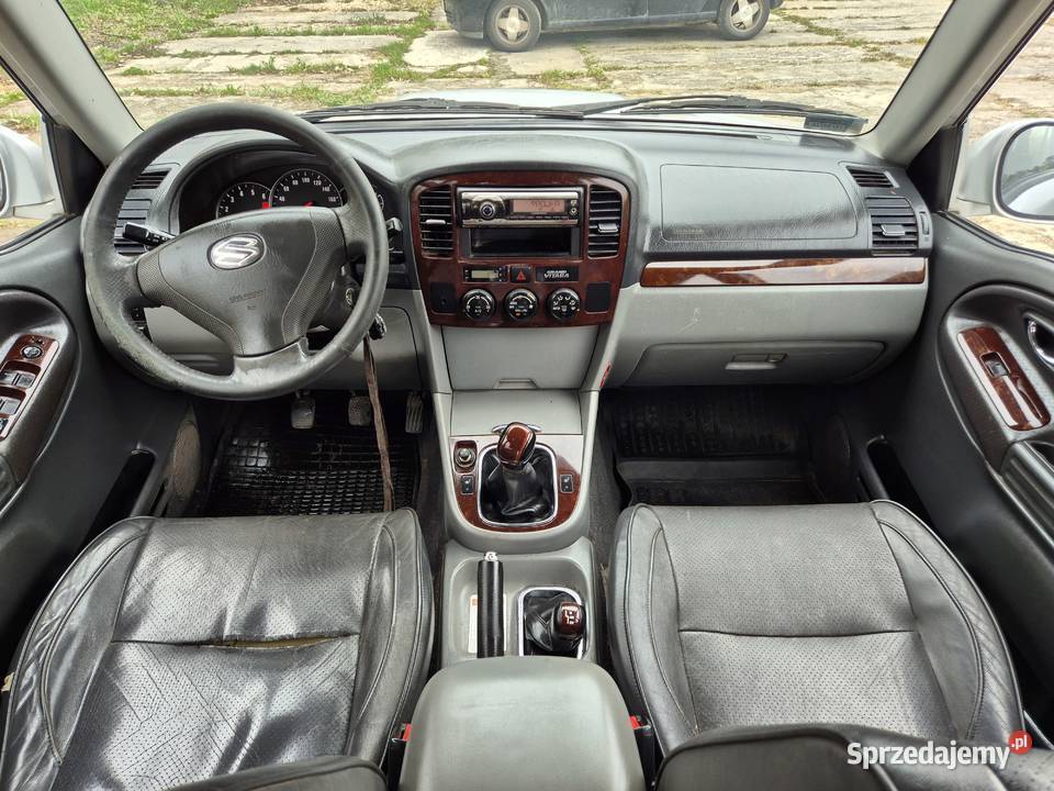 Suzuki Grand Vitara 20 TD Kratka Ciężarowy lakier metallic Tokarnia