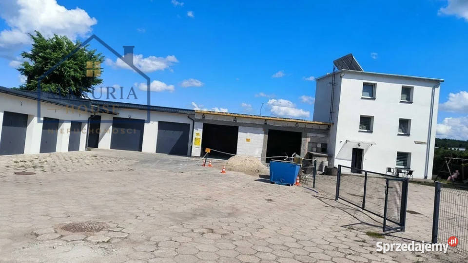Dwa budynki mieszkalne plus 16 garaży 228m2