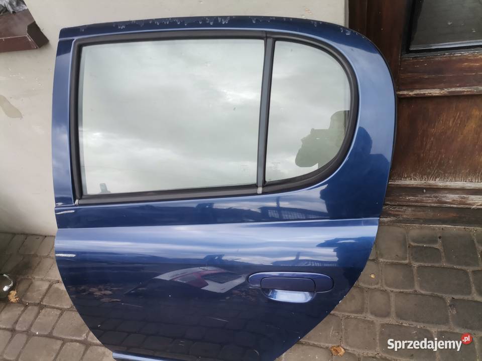 DRZWI LEWY TYŁ TOYOTA YARIS 1 8K8 Nowy Sącz
