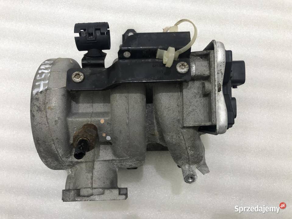 KOLEKTOR SSĄCY OPEL CORSA B 90570947