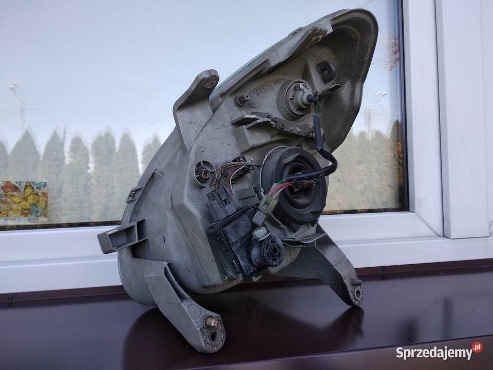 Daihatsu Sirion M100 lampa przednia prawa