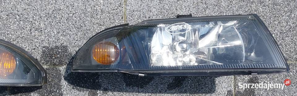 Mitsubishi carisma 00 reflektor lampa ciemna dolnośląskie Wrocław