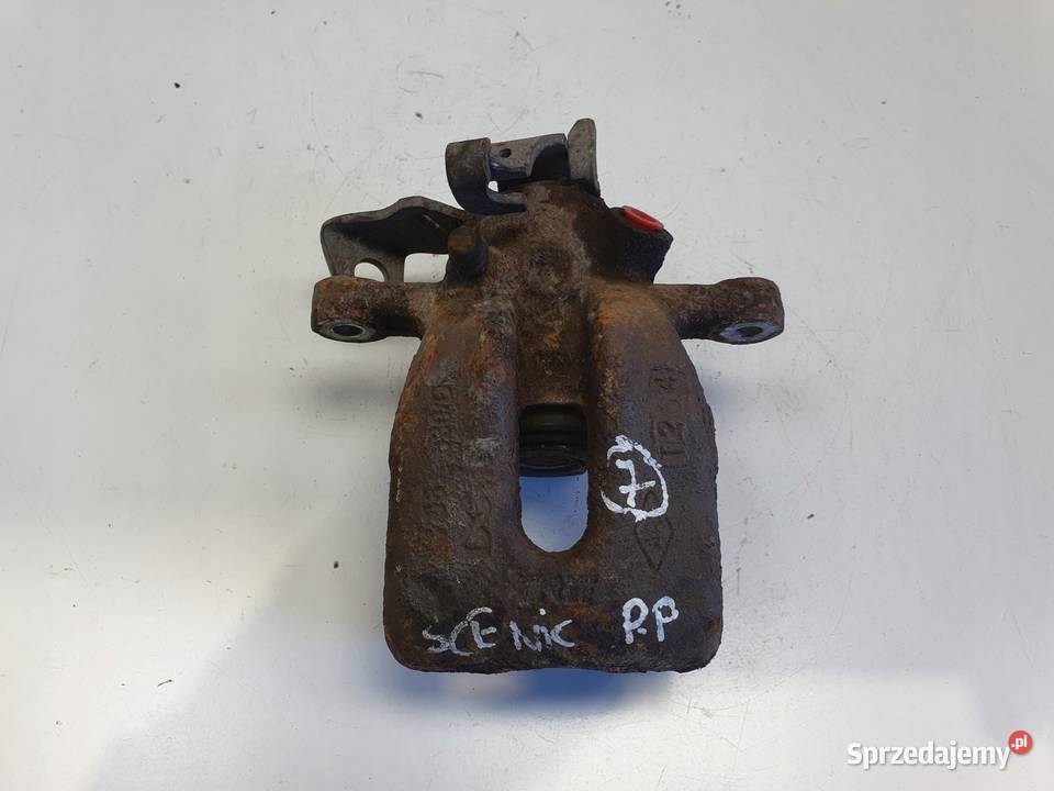 Renault Scenic II TYLNY ZACISK HAMULCOWY lewy osobowe Części samochodowe Rudka