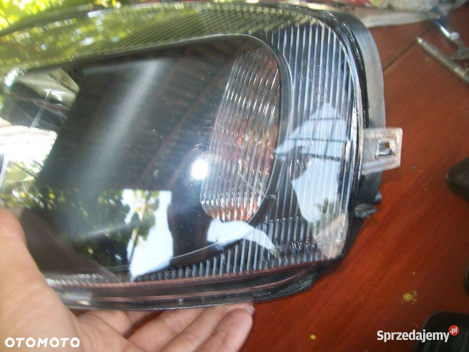 Lampa reflektor Opel ASTRA II TYC Europa Radom