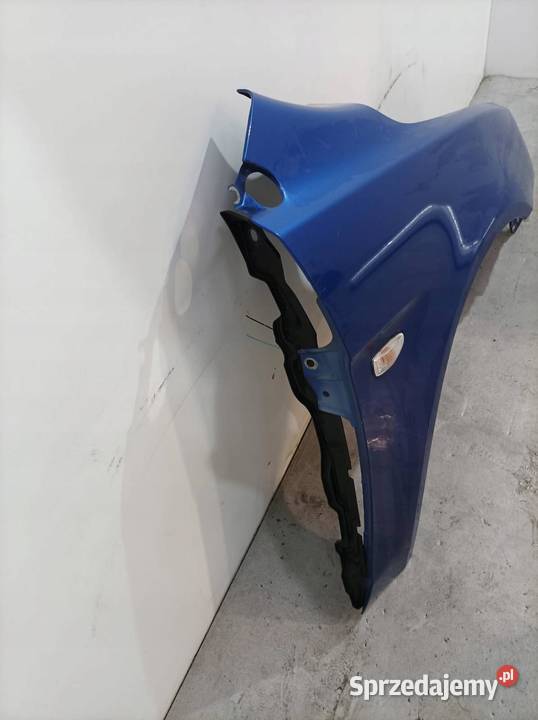 BŁOTNIK PRAWY PRZÓD D06 Mitsubishi Lancer VIII