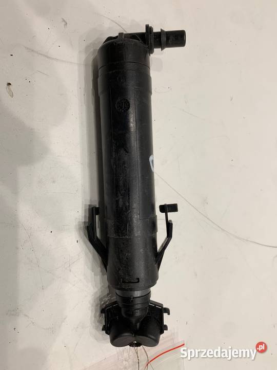 SPRYSKIWACZ REFLEKTORA PRAWY PRZÓD VW PASSAT B7 osobowe