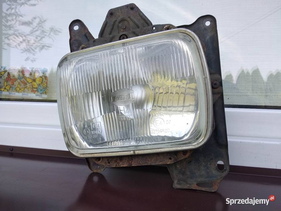 Nissan Navara D21 King Cab lampa przednia lewa osobowe Części samochodowe Sieradz