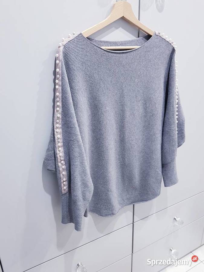 Damski dzianinowy sweter z ozdobnymi koralikami