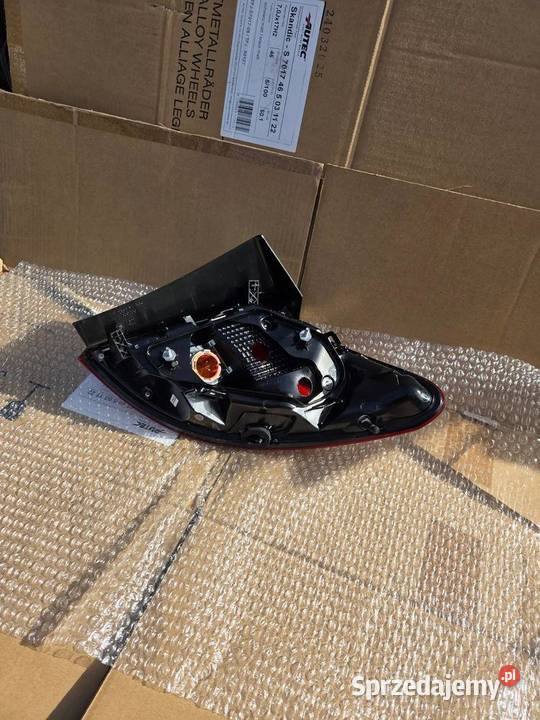 Lampa lewa lewy tył tylna Opel Meriva B 13410927 Lampy tylne