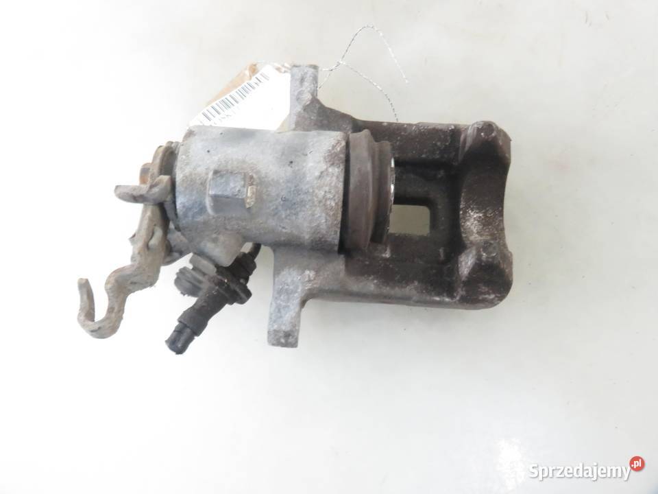 ZACISK LEWY TYŁ VW GOLF V 1K1 16 FSI BAG