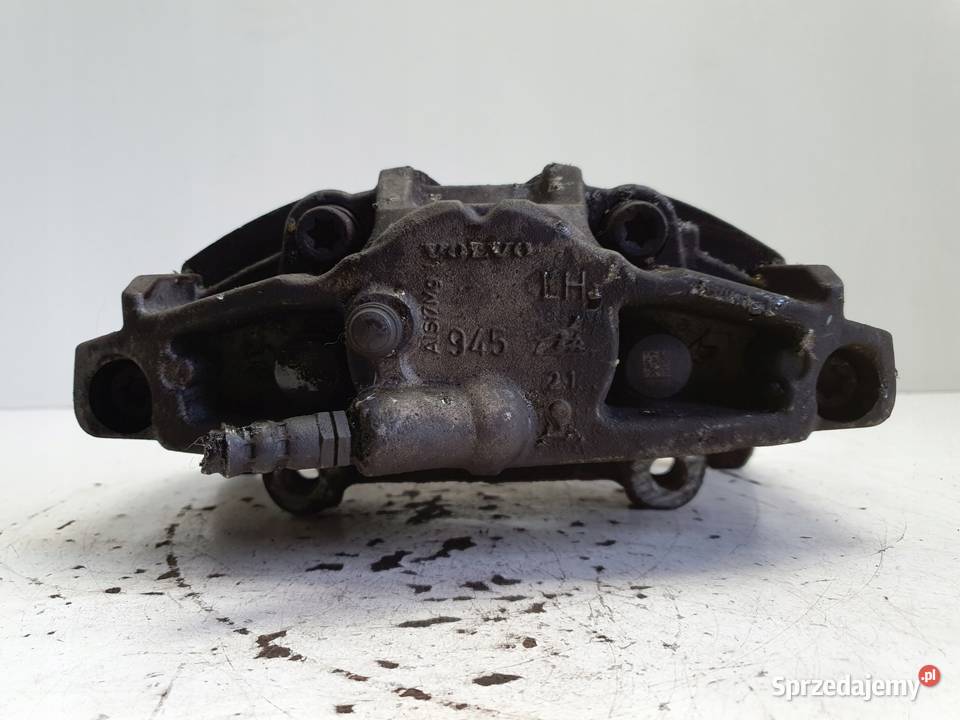 Volvo S60 II V60 I PRZEDNI ZACISK HAMULCOWY lewy Janów