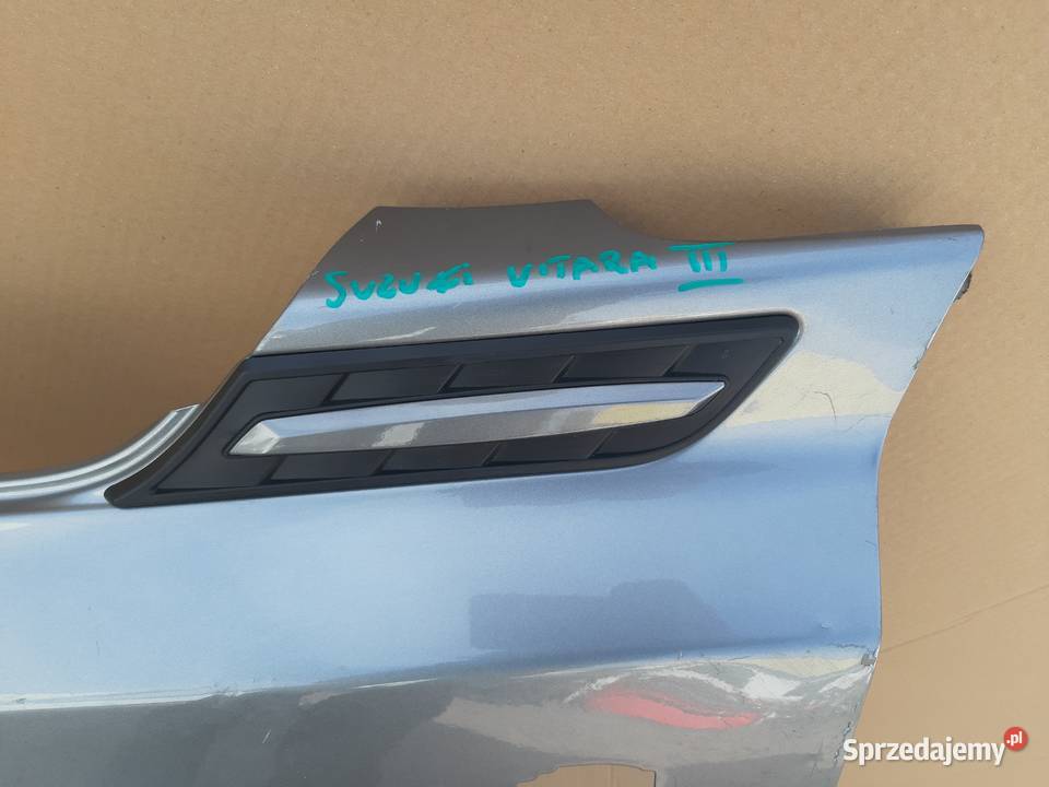 SUZUKI VITARA III BŁOTNIK LEWY PRZÓD Trzciel