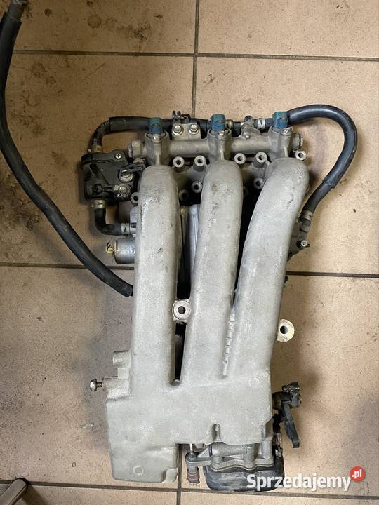 Suzuki DF 50 kolektor z przepustnicą i pompą Piła