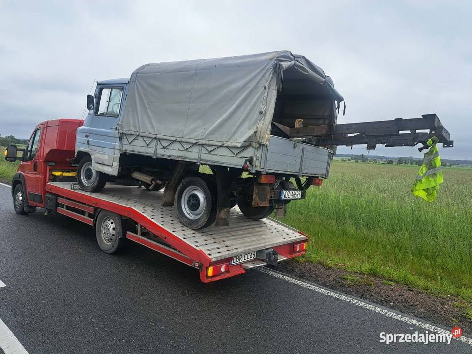 Auto laweta transport pomoc drogowa Pomoc drogowa i holowanie usługi moto