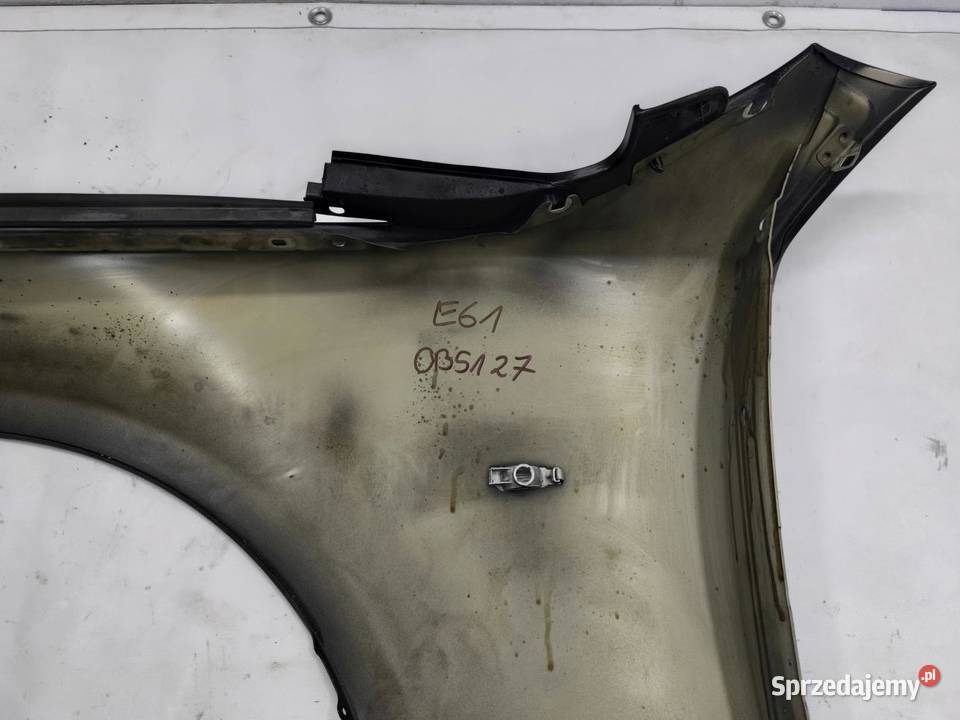 BŁOTNIK PRAWY PRZÓD 668 BMW E61 osobowe