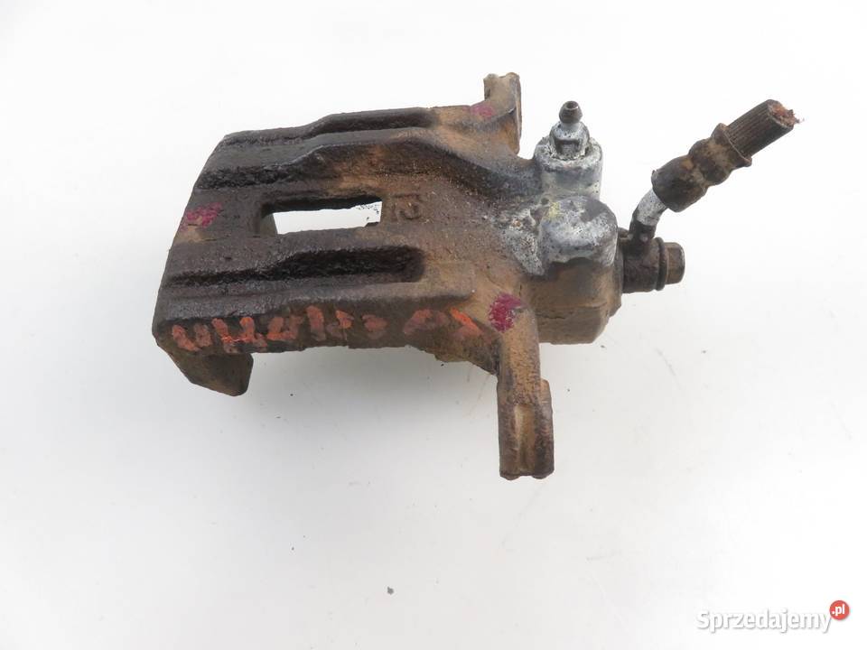 ZACISK PRAWY TYŁ NISSAN PATHFINDER III R51 40 osobowe