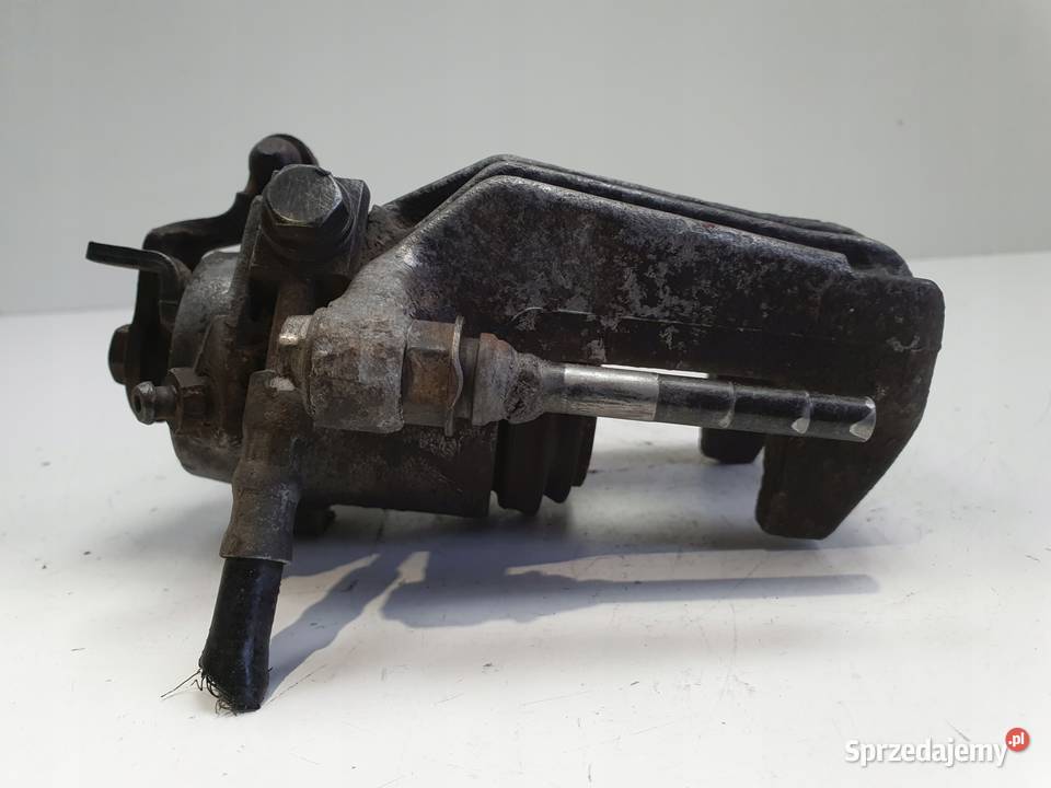 VW Golf IV Bora Audi A3 Toledo II LEWY ZACISK Chełm