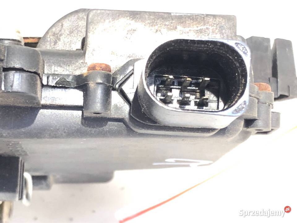 ZAMEK DRZWI LEWY TYŁ VW PASSAT B5 FL Hatchback