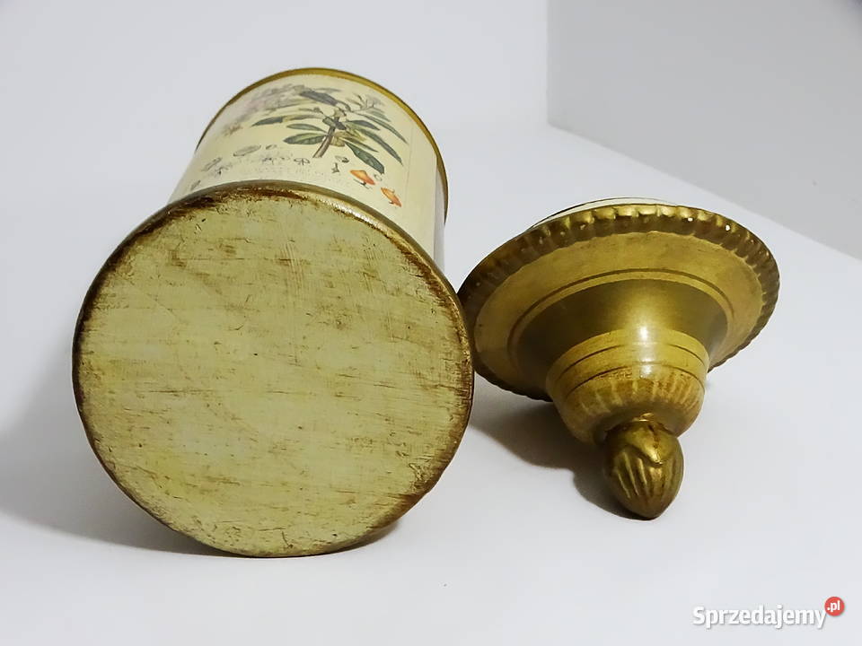 Zabytkowy pojemnik aptekarski z ilustracją