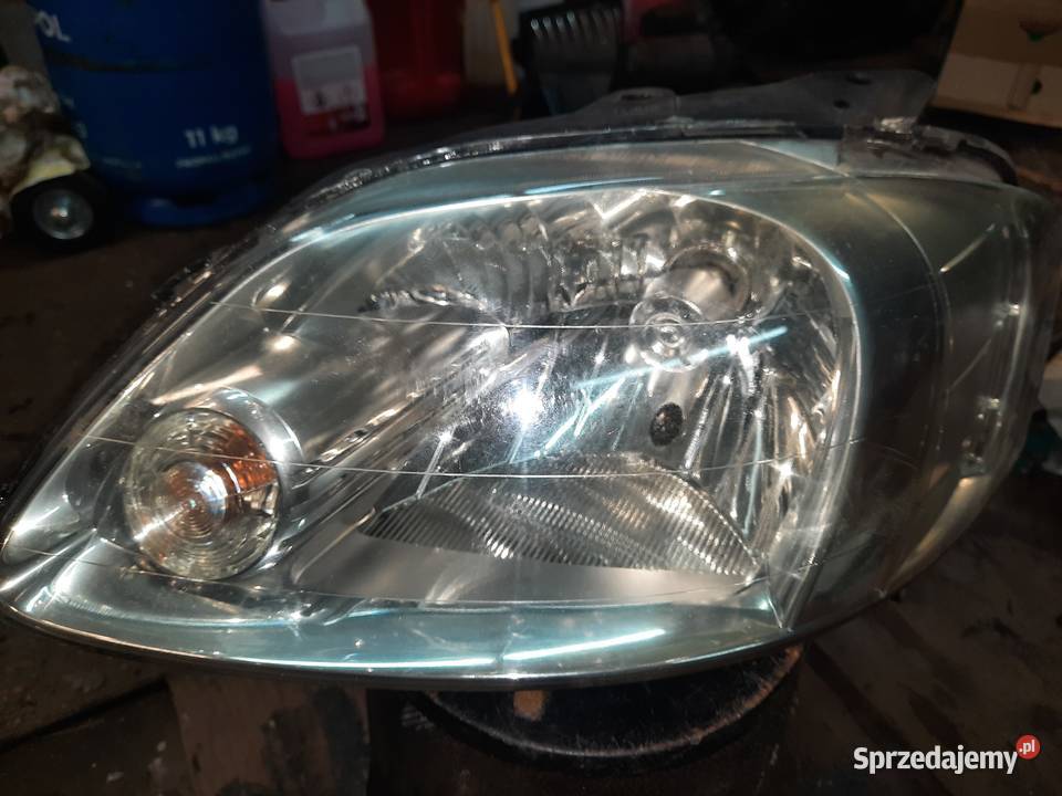 VW FOX Lampa przednia lewa manualna lewe Oświetlenie