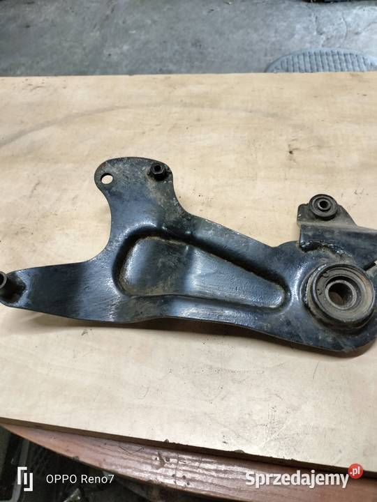 Wspornik koła uchwyt tłumika skuter Pozostałe Łubno