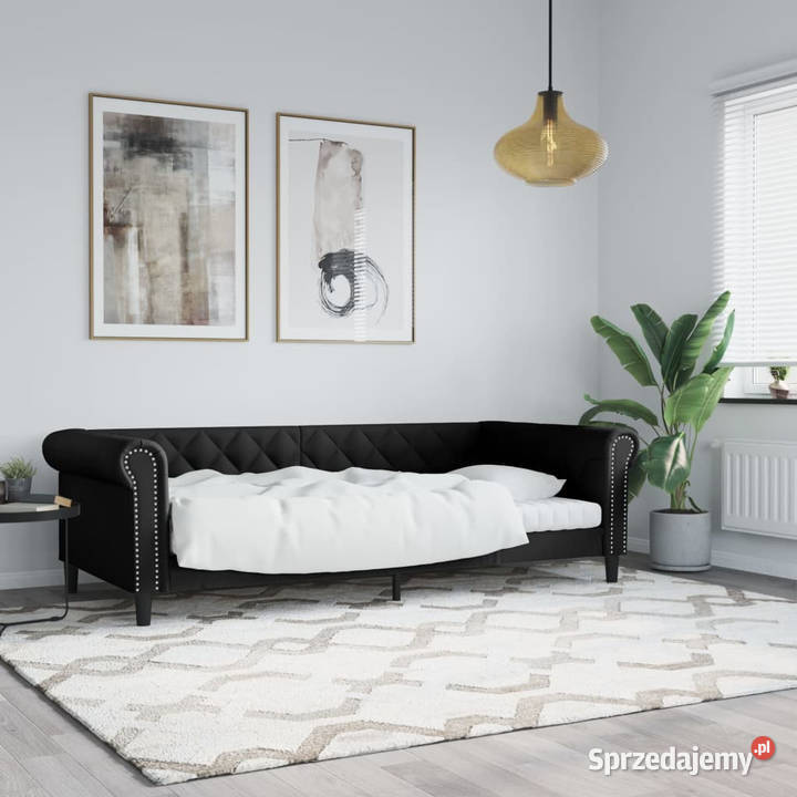 Sofa z funkcją spania czarna obita sztuczną Warszawa sprzedam