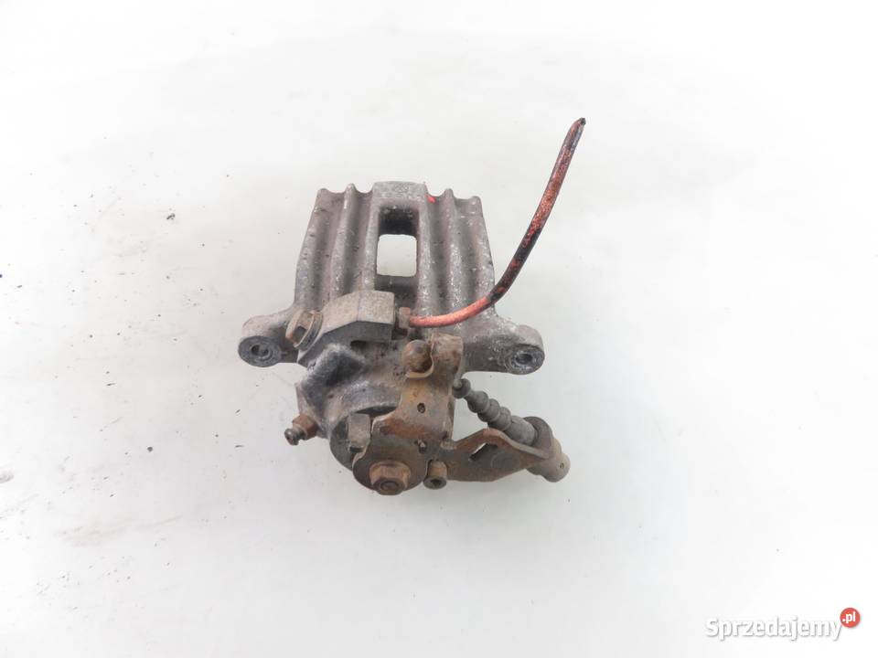 ZACISK PRAWY TYŁ SKODA OCTAVIA 19 TDI Części samochodowe