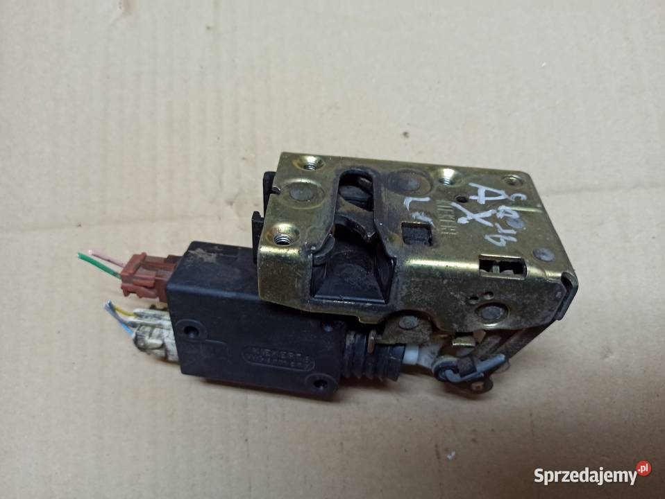 Peugeot 106 Citroen Saxo AX Zamek lewy przód osobowe Zamki, wkładki i kluczyki Zamki, wkładki i kluczyki Bolesławiec