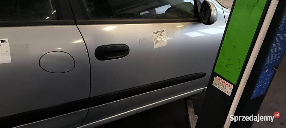 DRZWI PRAWE PRZÓD NISSAN ALMERA KL0