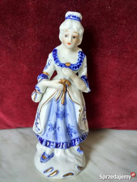 Figurka z porcelanydama z brawami Ropa