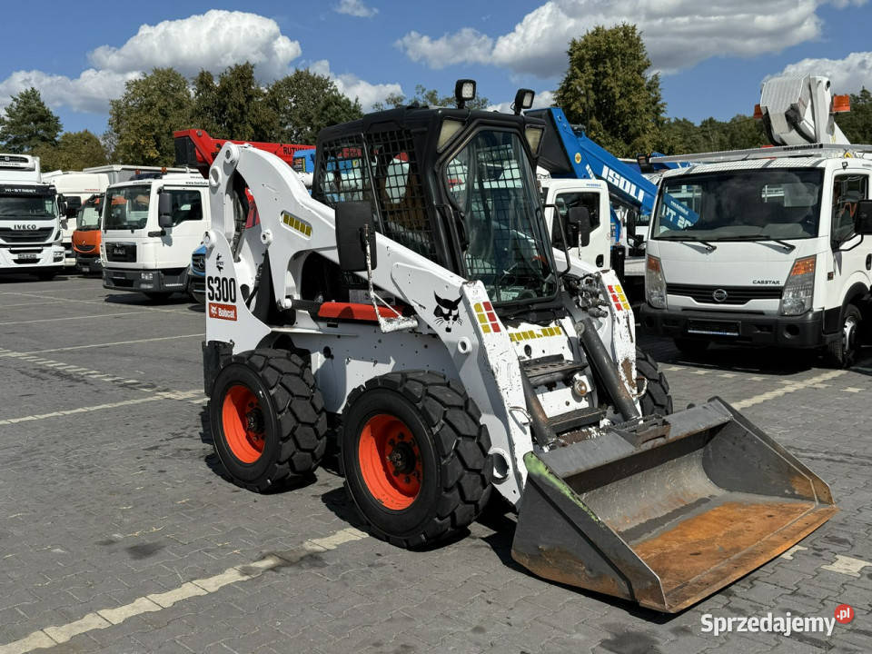 o sterowaniu burtowym Bobcat S300 Joystick Mini Rok produkcji 2009 Widełki
