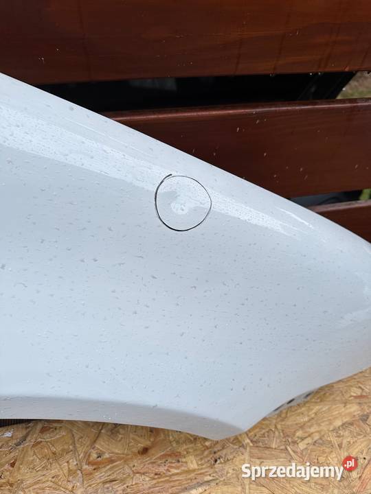 Volkswagen 1K6880682A biały golf V błotnik prawy Mirsk