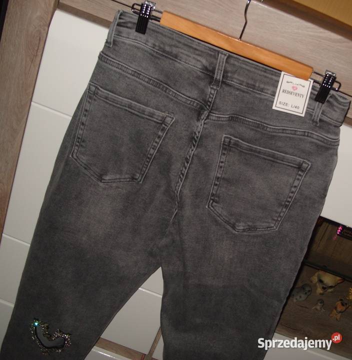 jeansy z serduszkiem pasek REDSEVENTY r L XL Bez wzoru