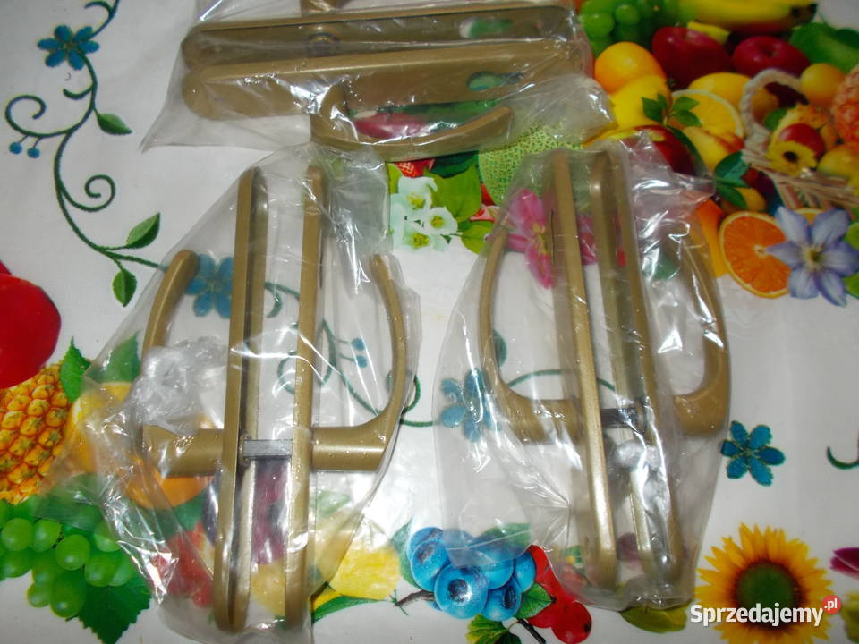 Klamka z długim szyldem 90 mm złota na wkładkę