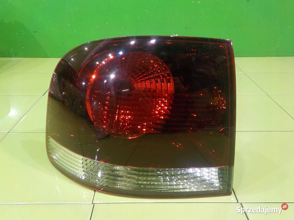 VW TOUAREG I LIFT 08r 5D lampa lewa tyl Suków