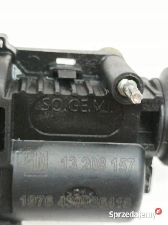 SIŁOWNIK KLAPKI WLEWU PALIWA 13208157 Opel Corsa