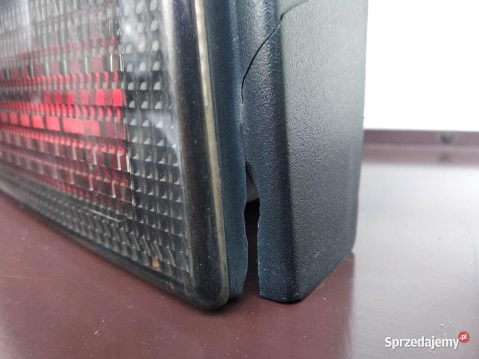 VW Polo III 6N lampy tył tylne Hella Black prawa Lampy tylne Sieradz