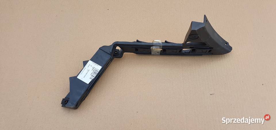 VW TIGUAN ŚLIZG ZDERZAKA LEWY TYŁ UCHWYT Trzciel