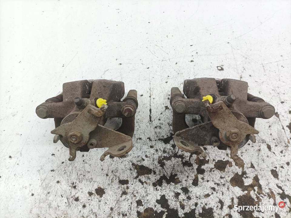 ZACISK HAMULCOWY PRAWY LEWY TYŁ KPL 15 DCI