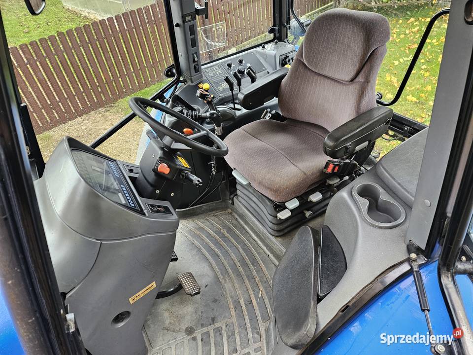 Ciągnik holland tm 125 tm ts podlaskie Sejny sprzedam